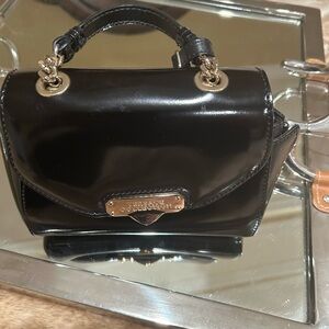 Versace Mini Bag ..Black Patent Leather with / gold accents.